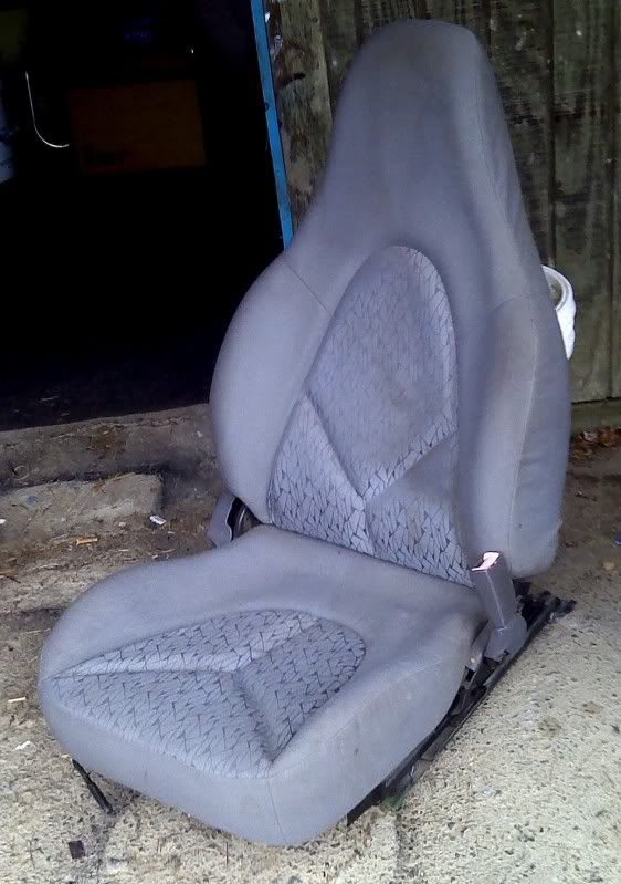 Looks like a glorified Ford Probe seat. Looks like a glorified Ford Probe seat.