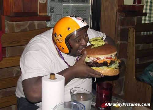fat guy eating cheeseburger. fat guy eating fat burger