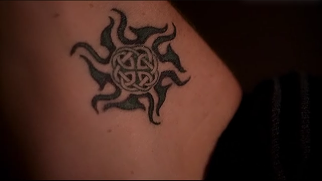 tribal sun tattoo with six leaf-951