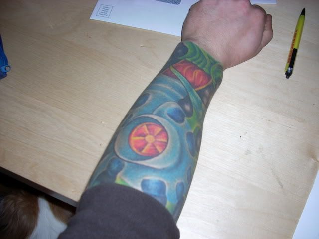 I have a biomechanical turbo piece on my left arm A few other tattoos along