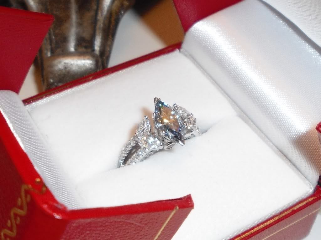 Just listed a blue marquise moissanite and diamond ring on the bistro