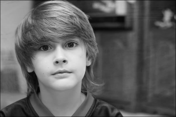 IMAGE: http://i84.photobucket.com/albums/k27/slotstikcam/portraits/Travis1.jpg