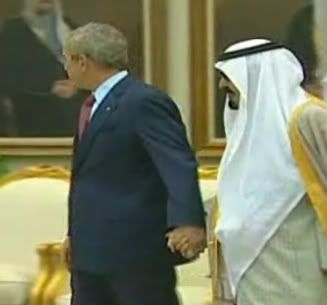 Bush and Abdullah hold hands