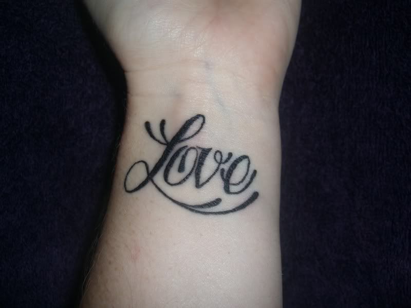 Abstract tattoo:love permanent hand